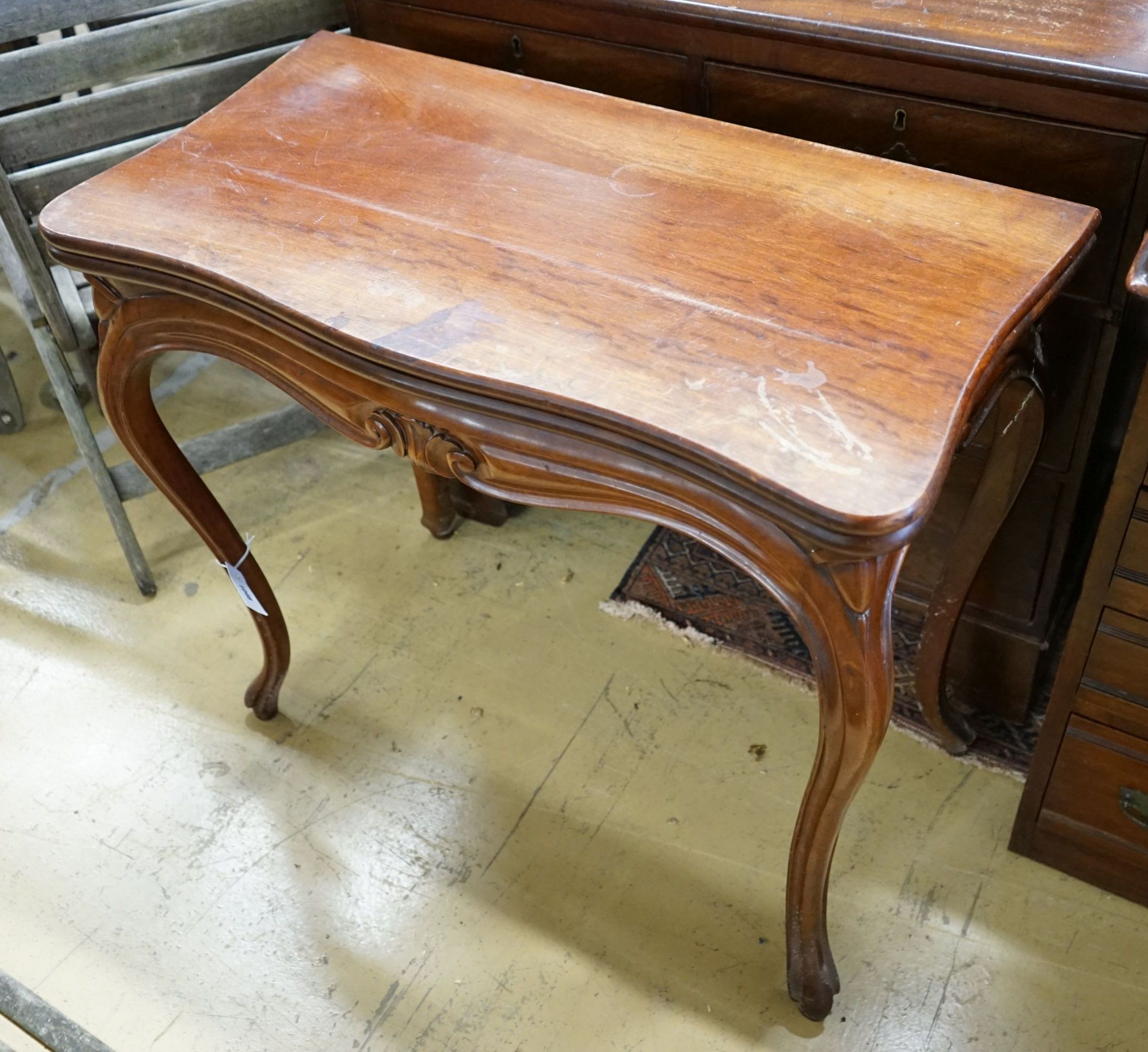 A mahogany French folding card table, width 84cm, depth 43cm, height 75cm